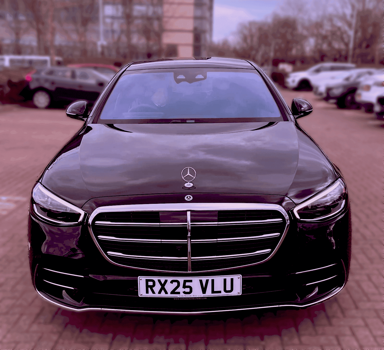 Front view of a black Mercedes S560E luxury saloon from Carey International’s chauffeured fleet.